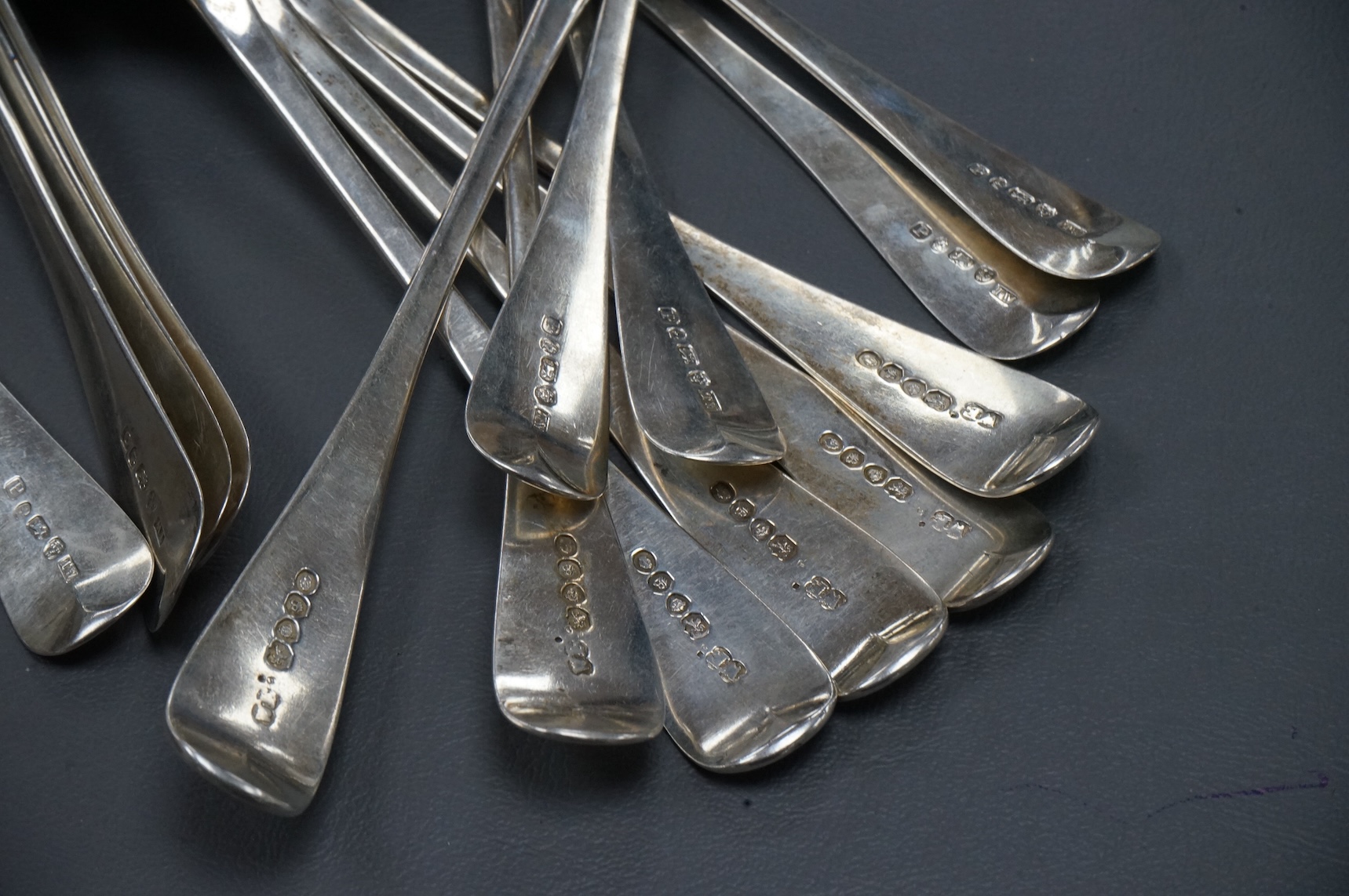 A set of six early Victorian silver Old English pattern table spoons, by William Bateman, London, 1837, 22.5cm, together with a set of eight provincial silver Old English pattern dessert spoons, Thomas Wheatley, Newcastl